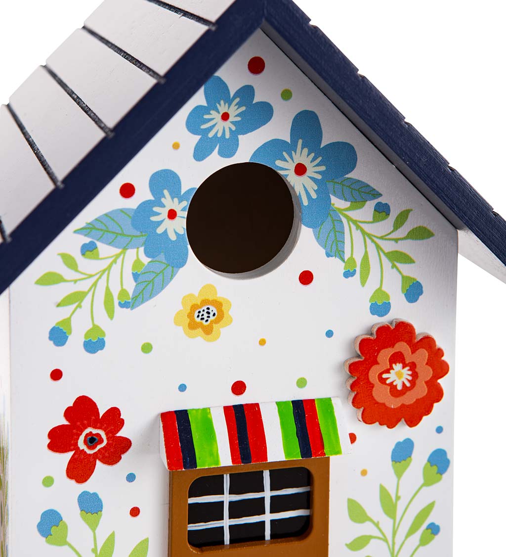 Hand-Painted Blooming Birdhouse with Floral Design