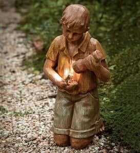 Solar Garden Statue Boy With Flashlight And Frog