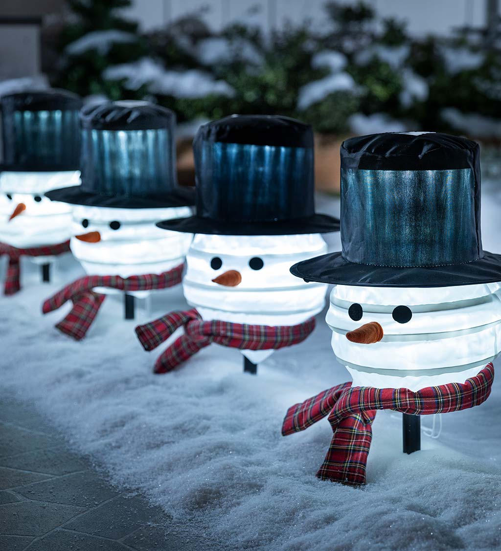 Create a Magical Winter with a DIY Lighted Glass Block Snowman