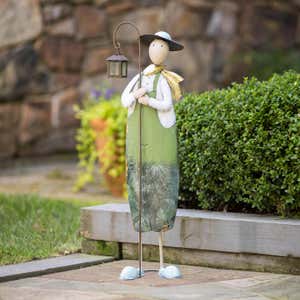 Metal Lantern Farmer Statue