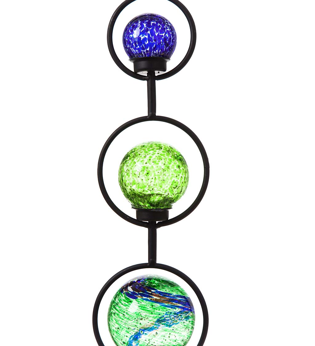 Glow-in-the-Dark Art Glass Globes with Metal Frame Garden Stake