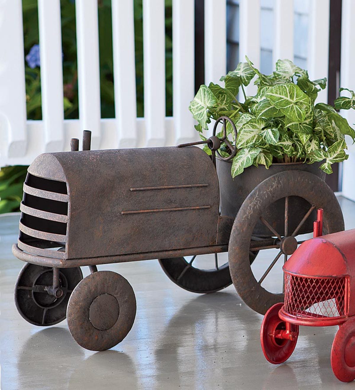 Image of Vintage tractor flower planter with rusty finish