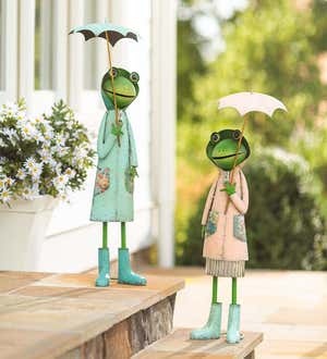 Image of a pair of whimsical metal frog statues with umbrellas. Shop Garden Statues