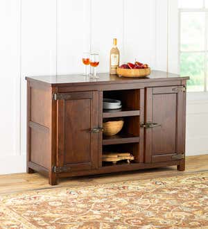 A Portland Ice Box Buffet Cabinet in warm brown wood finish.