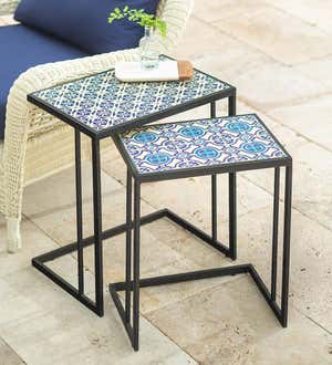 OUTDOOR SIDE TABLES > Image of a pair of nesting outdoor side tables with blue tile tops.