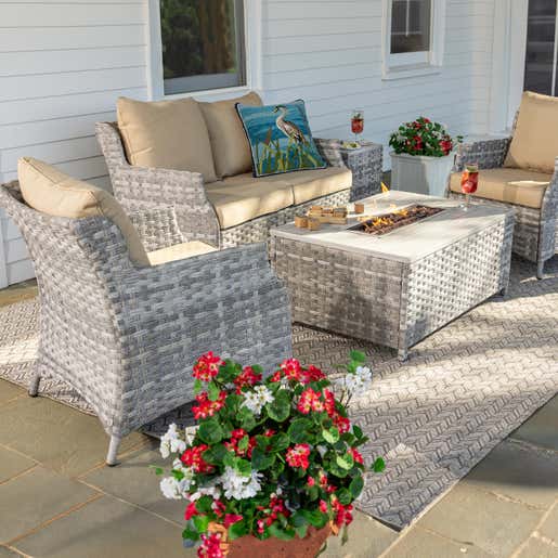 WICKER FURNITURE > Image of a gray wicker St. Helena wicker patio seating set with fire pit table. 