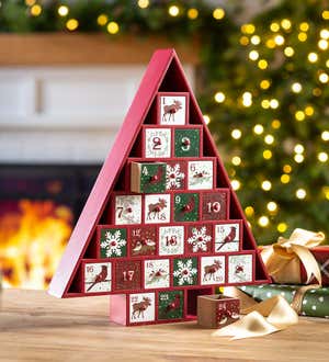 A red and white wooden Christmas Tree shaped advent calendar